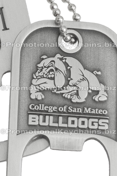 Close up of the bull dog logo detail of a antiqued nickel, die cast bottle opener dog tags with chains.