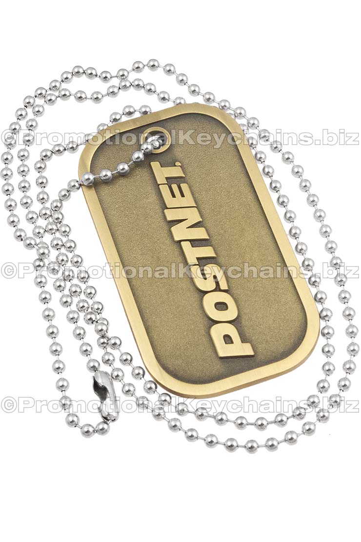 Brushed Antiqued Custom Die Cast Dog Tag. Antiqued brass plated and raised text style logo for the design. Ball chain shown with tag.