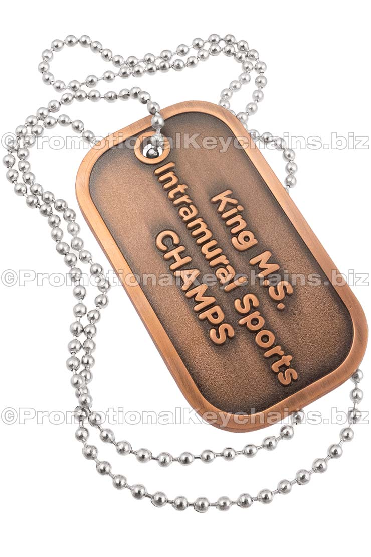 Brushed Antiqued Die Cast Custom Dog Tag and neck chain. Antiqued copper plated and raised text for the design.