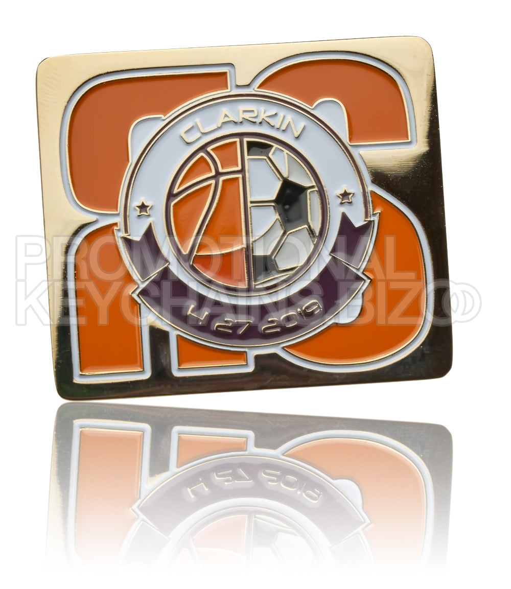 A square polished gold medallion featuring a basketball and soccer icon with white, orange, purple, and black soft enamel color.