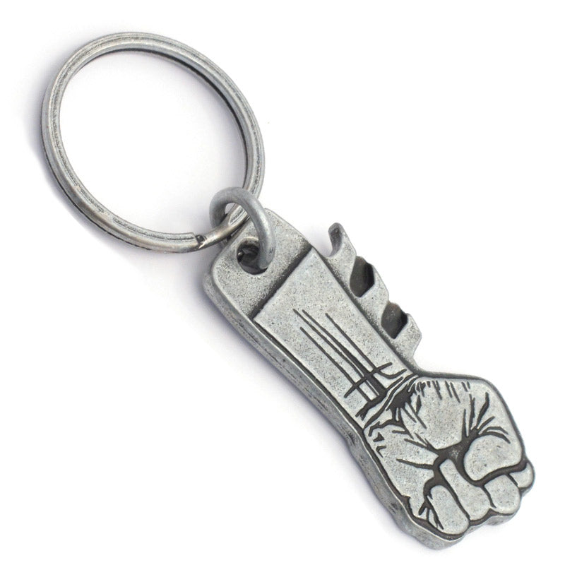 An antiqued nickel keychain featuring a clenched fist design debossed on the front side.
