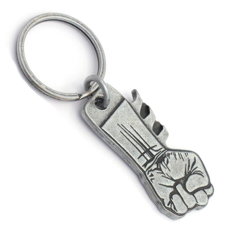 An antiqued nickel keychain featuring a clenched fist design debossed on the front side.