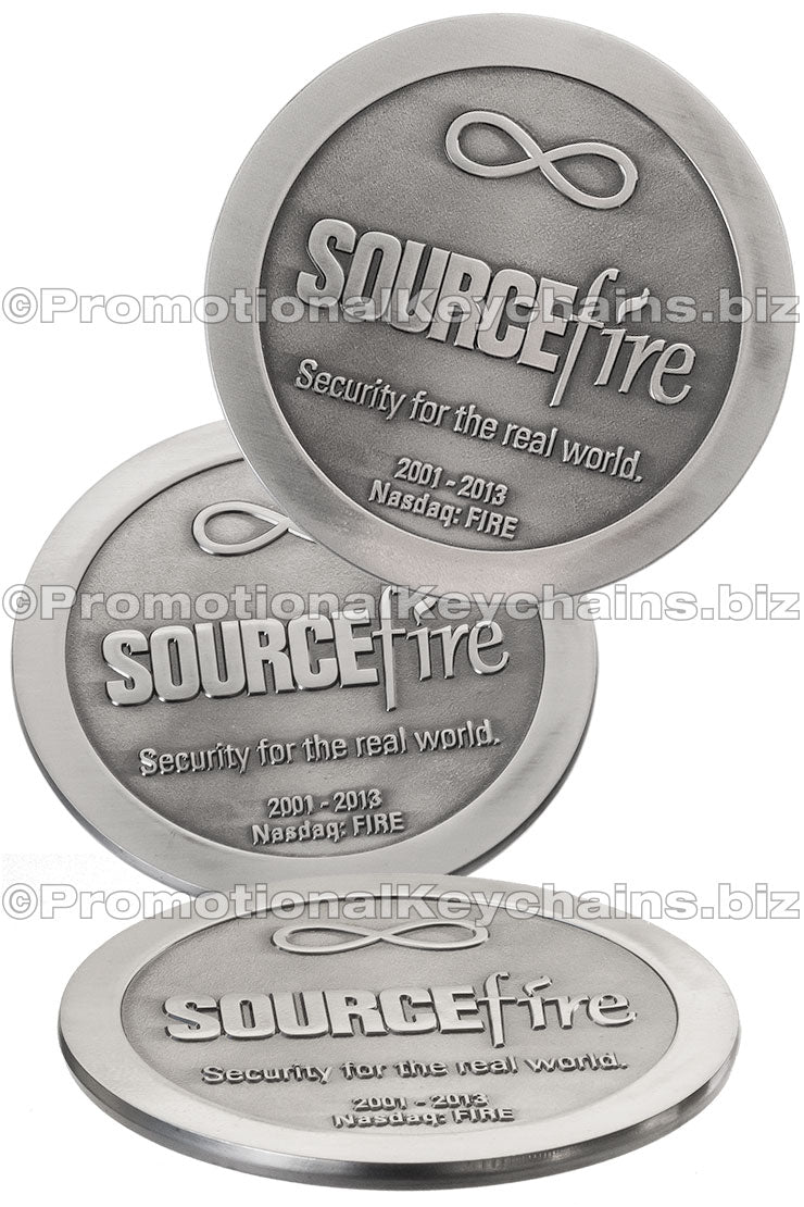 Three angles of the same antiqued nickel coaster featuring the Sourcefire logo.