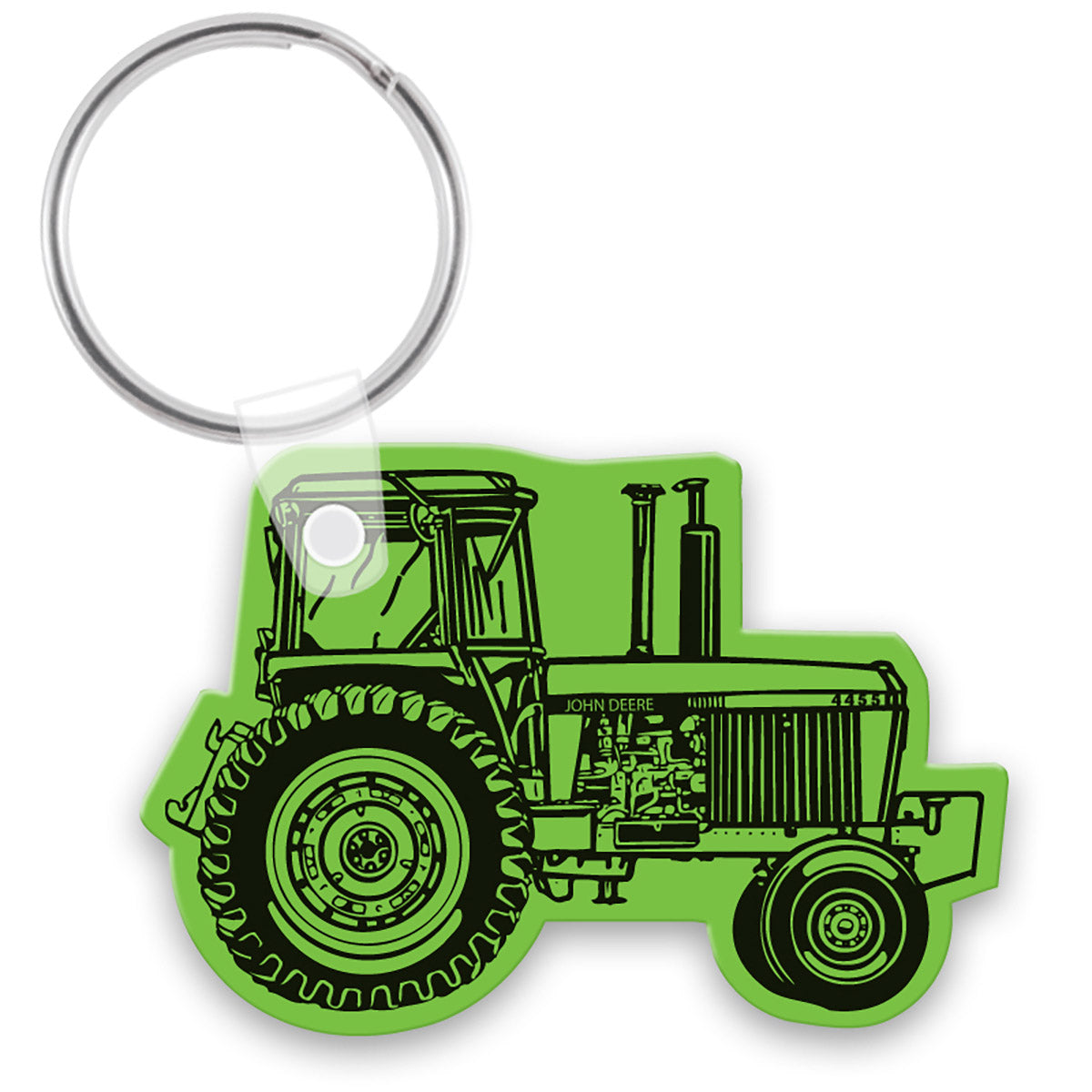 Green tractor-shaped keychain on a white background