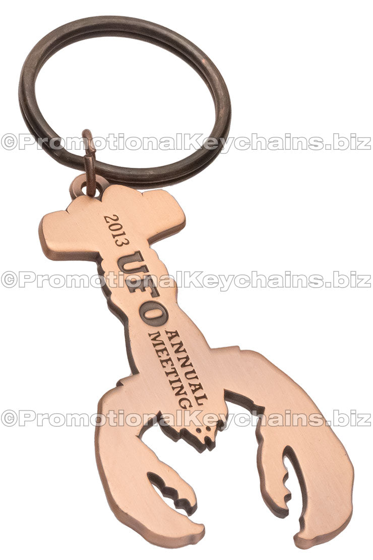 Lobster shaped custom bottle opener keychain, in antiqued copper.
