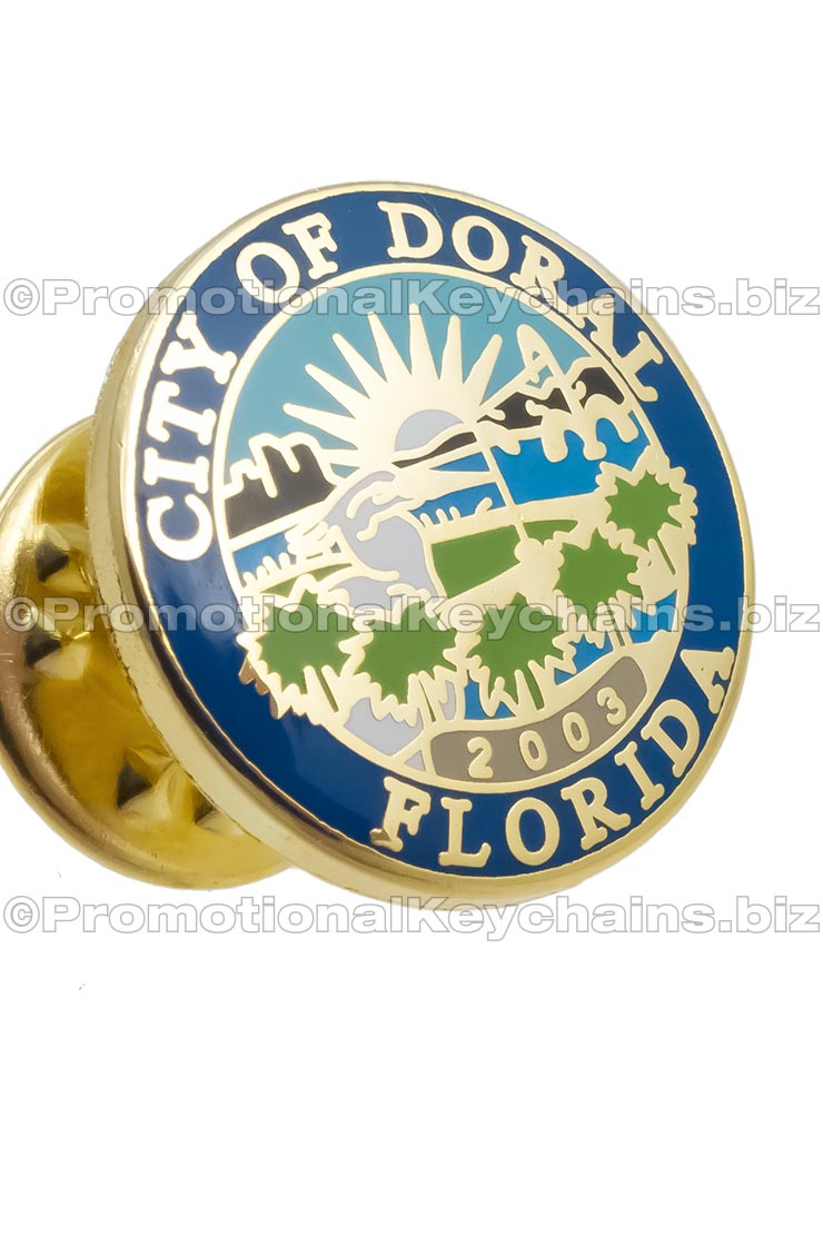 Image of circle shaped hard enamel lapel pin. Design City of Doral Florida, in gold plating and multiple enamel colors.