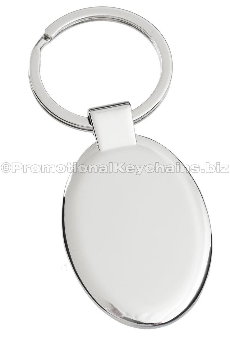 The blank back of a polished metal ovular keychain.