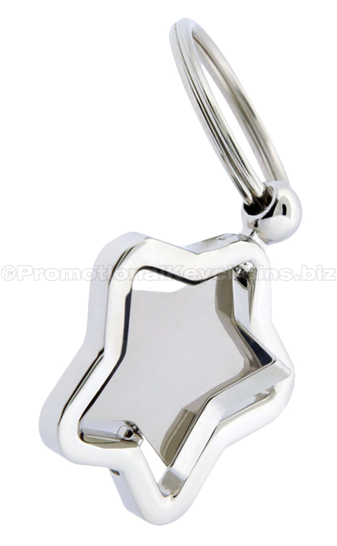 A polished metal star-shaped keychain with a spinning center.