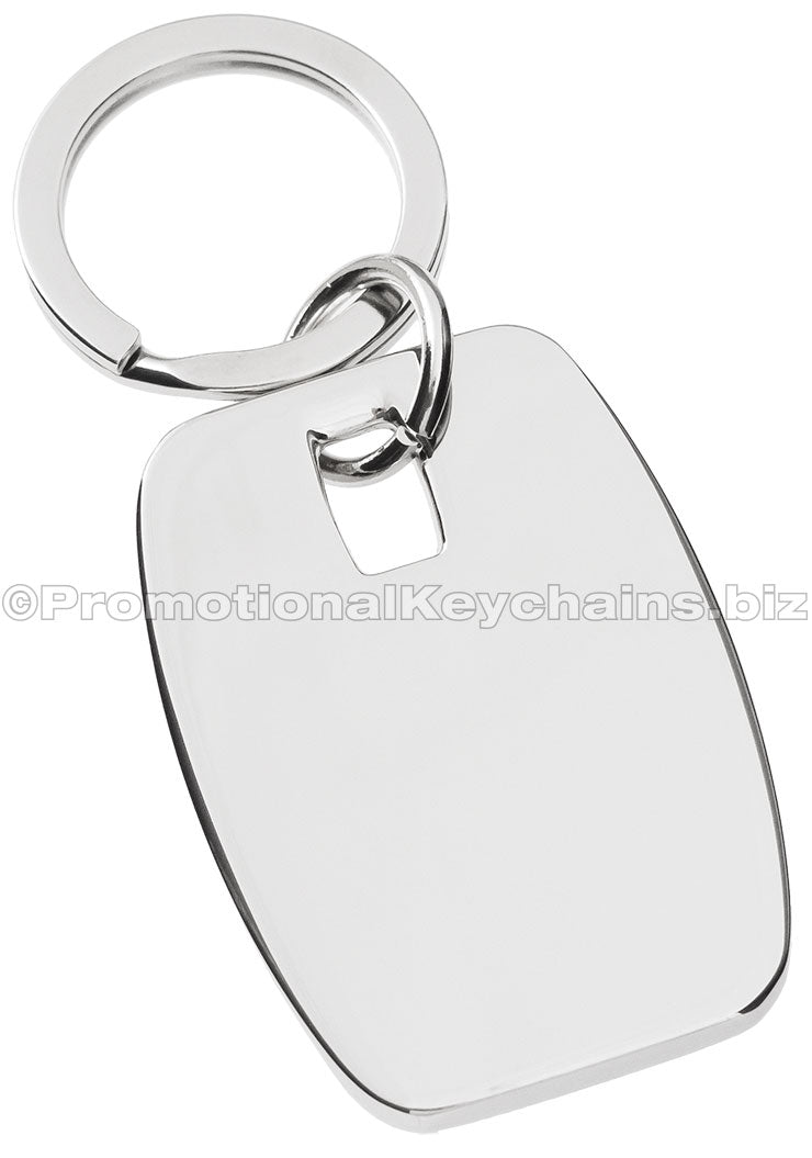 The blank back of a rectangular polished metal keychain.