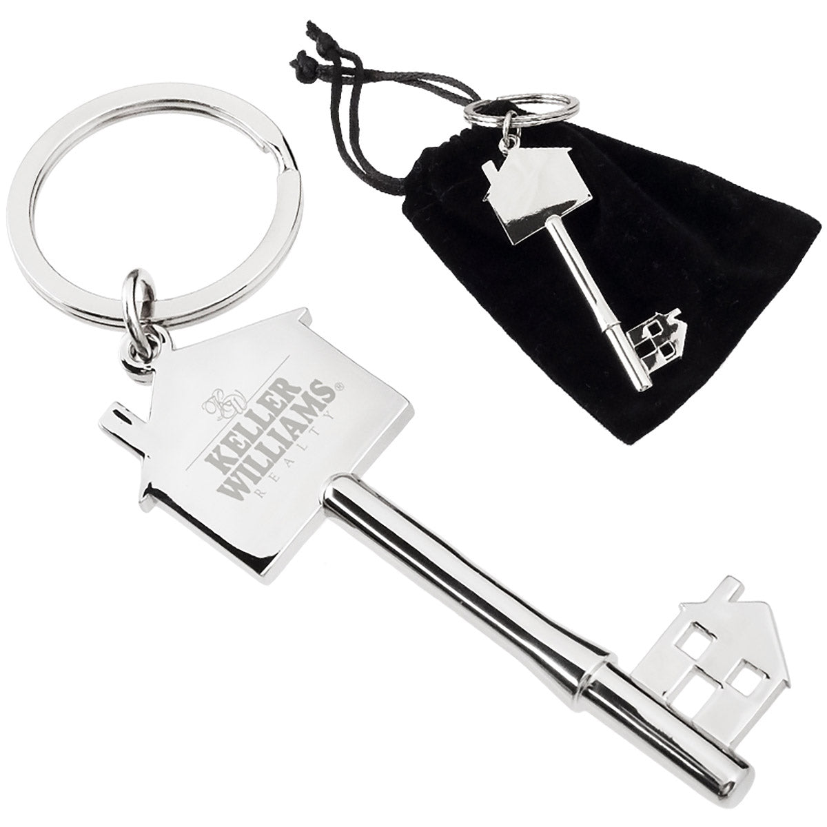 There are two images. On the right, a polished key-shaped keychain featuring a house silhouette, resting on top of a black velvet drawstring bag. On the left is the same keychain with a logo clearly engraved in the center.