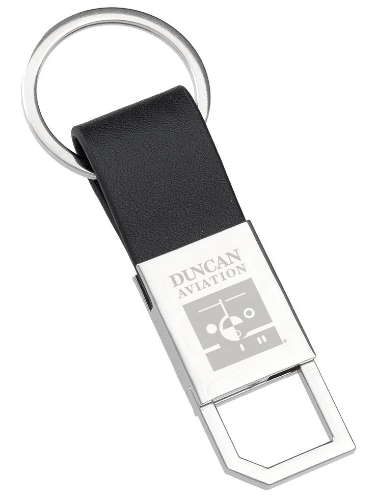 A polished metal keychain with a leather strap and a pull and twist feature on the other end, engraved with the "Duncan Aviation" logo.