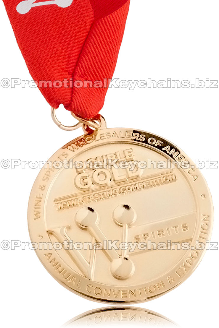 A polished gold medal with red ribbon, labeled "Double Gold" for Wine & Spirits Wholesalers of America, featuring a logo and event details.