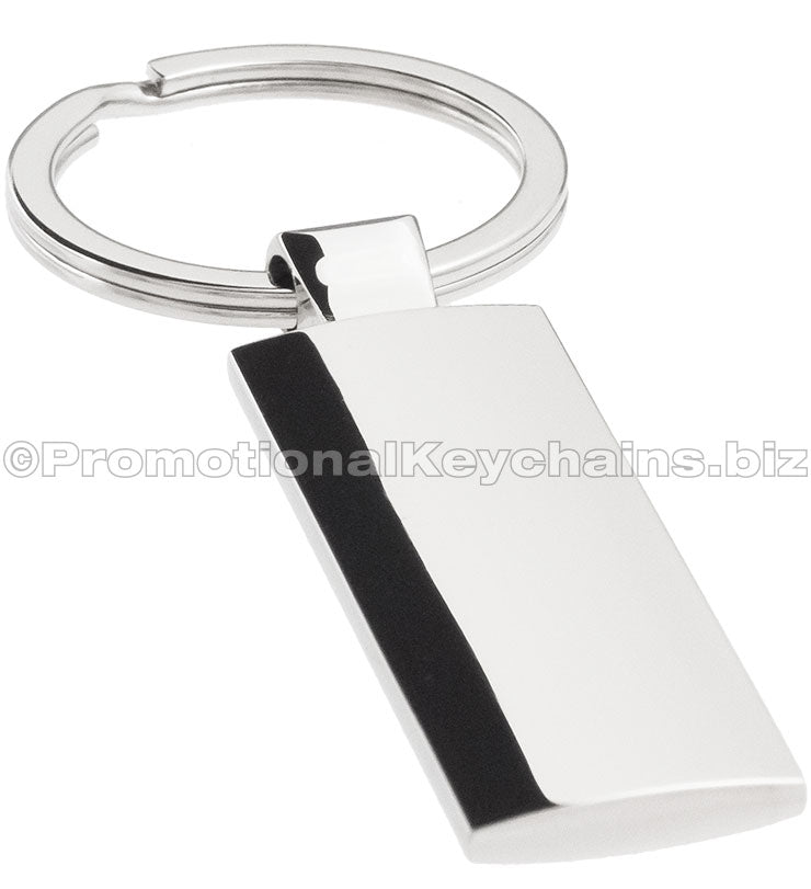 A rectangular polished metal keychain.