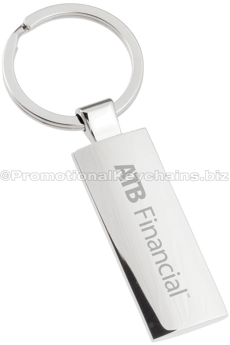 A rectangular polished metal keychain with "ATB Financial" engraved down the center.