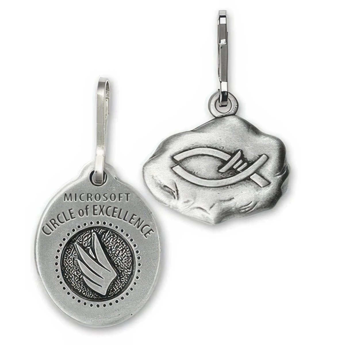 Two customized genuine pewter zipper pulls, one featuring Microsoft branding and the other featuring the ichthys symbol.