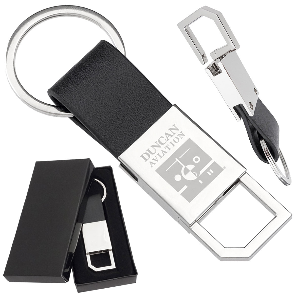 There are three images. On the left, a polished metal keychain with a leather strap and a pull and twist feature on the other end displayed in a black gift box. In the center is the same keychain with a logo clearly engraved in the center, and on the right is an image of its side profile.