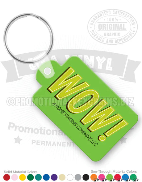 Green vinyl keychain with tab, with WOW printed in yellow.