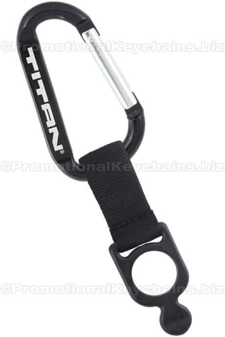 A black carabiner with a black nylon strap and bottle holder attached, with the TITAN logo laser engraved. 