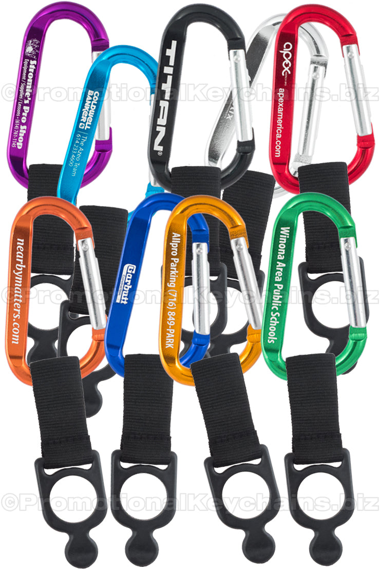 A collection of carabiner keychains in various colors including black, blue, green, orange, purple, red, and silver, all with customized engraving.
