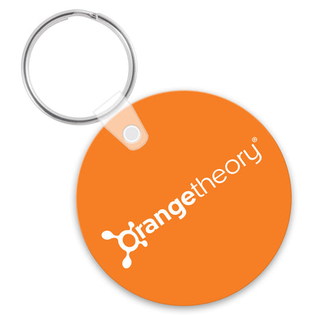 Round orange keychain with a white custom logo imprint