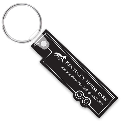 Black trailer shaped keychain with white text and horse design on a white background