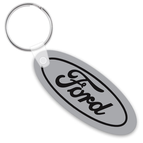 Gray oval keychain with a black logo imprint