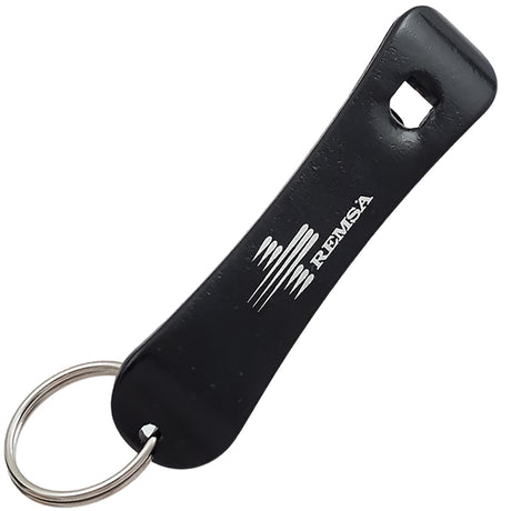 Black colored bottle opener keychain shaped like a snowboard with a customized engraving on the bottom