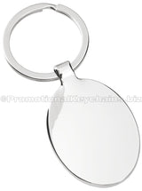 The back of a polished metal keychain in an ovular shape.