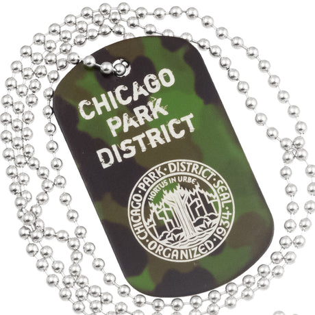 Close up example of camouflage anodized aluminum dog tag with engraving of text and logo. Image also shows the 30" ball chain. 