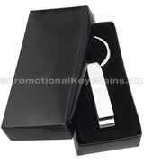 Example of Classic Chrome Bottle Opener Keychain inside black gift box. 