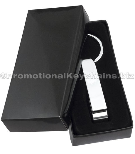 Example of Classic Chrome Bottle Opener Keychain inside black gift box. 