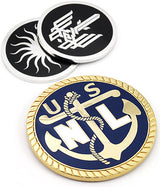 There are three different coaster designs featured. At the bottom, a polished brass coaster featuring an anchor and "USNL" text with a blue enamel color background. At the top,  two polished nickel coasters placed on top of each other, each with a black enamel background and various designs in the center.