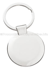 The blank back of a circular polished metal keychain.