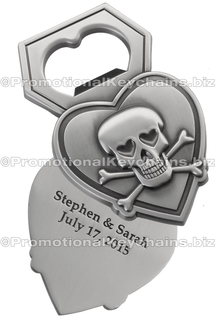 Custom Die Cast 3D/2D Bottle Opener Antiqued. Antiqued nickel plated bottle opener. Design shaped like a heart with a 3D skull and bones in center. 