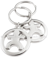 Two angles of the same polished nickel keychain featuring a cutout design of a stylized human figure in the center of a circle.