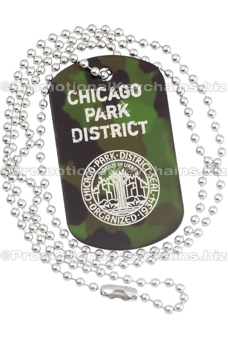 Example of camouflage anodized aluminum dog tag with engraving of text and logo. Image also shows the 30" ball chain. 