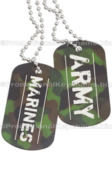 Two camouflage engraved dog tags hanging from chains. The engravings have a military theme and say Marines and Army. 
