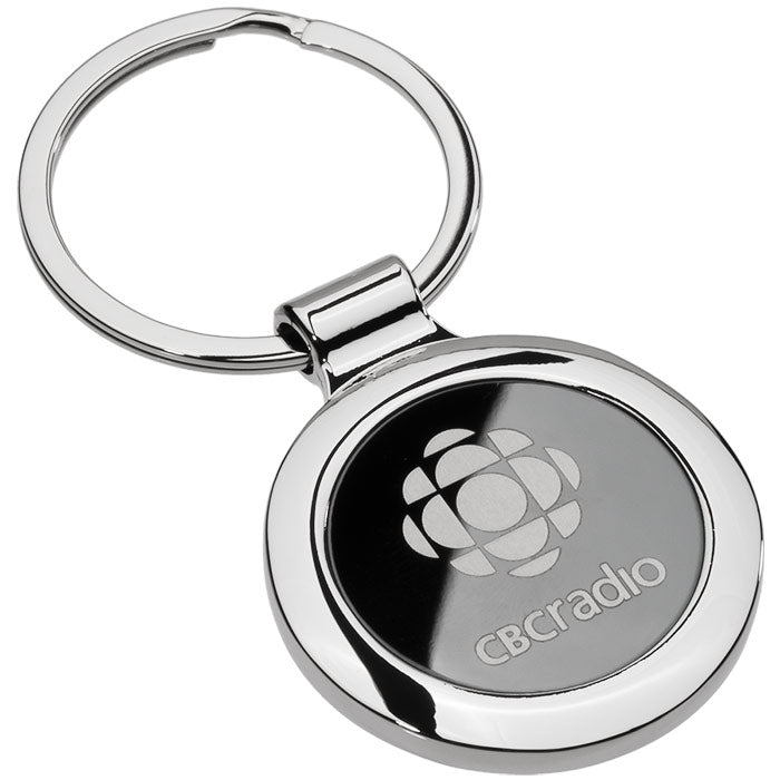 Chrome keychain with CBC Radio logo the front on a white background