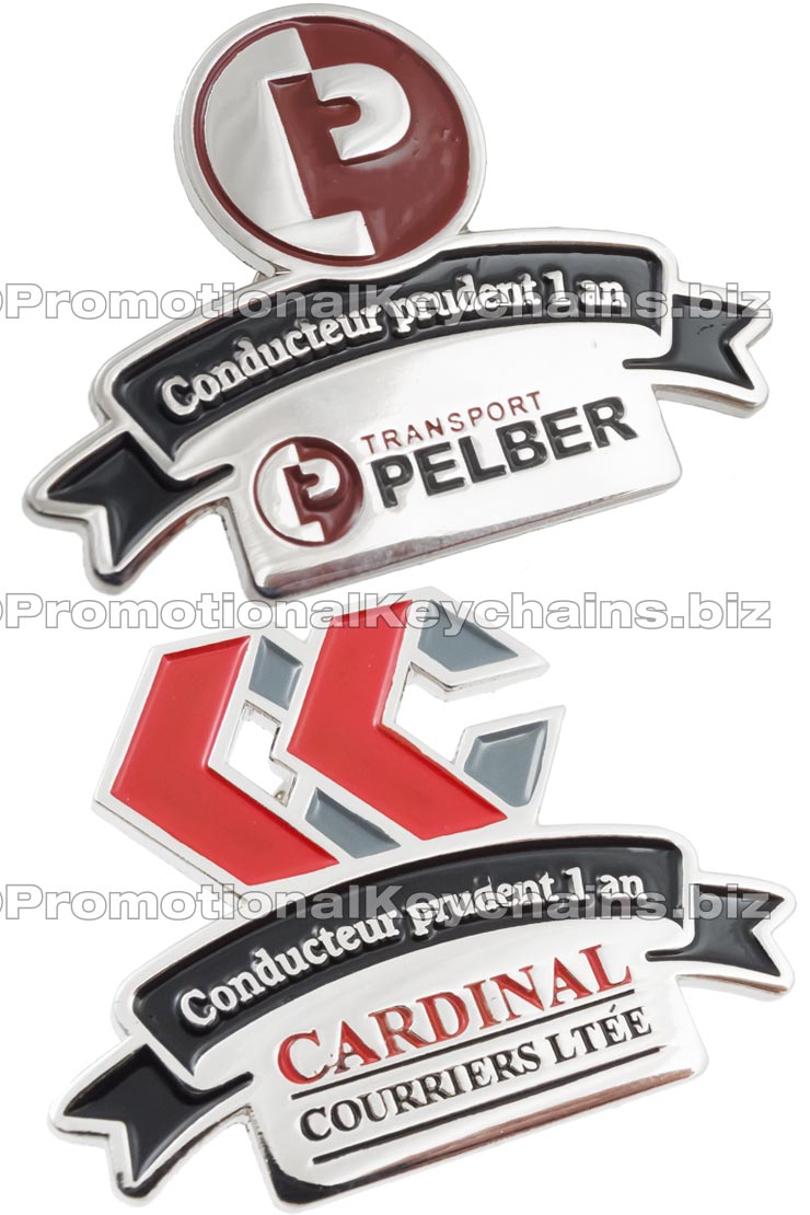 Image shows two Value Series Classic Die Struck lapel pins that are custom shapes and silver plated. With enamel colors of reds and black. 