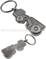 Both sides of an antiqued nickel keychain with a 3-dimensional tractor design on the front and the Kress Corporation's logo and contact info on the reverse side.