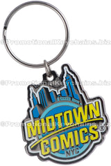 A polished black nickel keychain featuring a blue and yellow enamel color Midtown Comics logo.