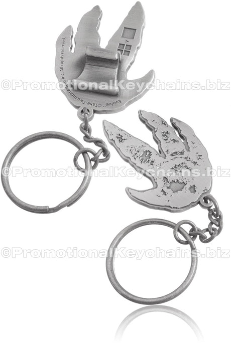 Custom shaped claw style bottle opener. Bottle opener is shaped like a dinosaur foot print. On the back is the claw style hook. 