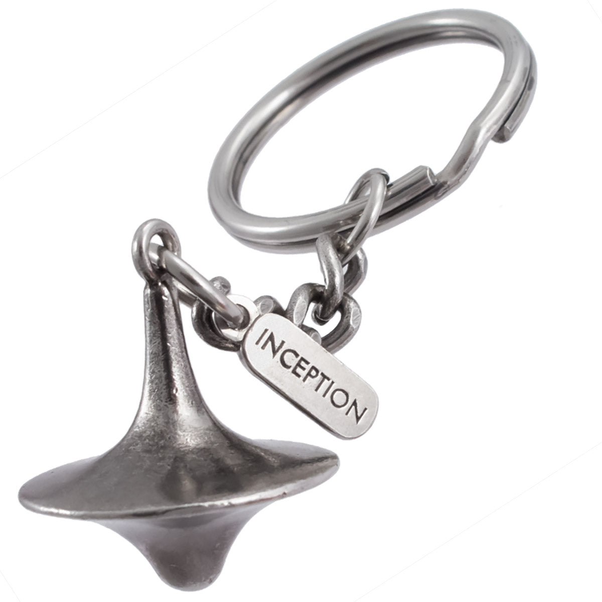 Custom made metal keychain shaped like the spinning top from the film Inception