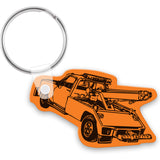Vinyl / plastic keychain with a black tow truck design on a white background
