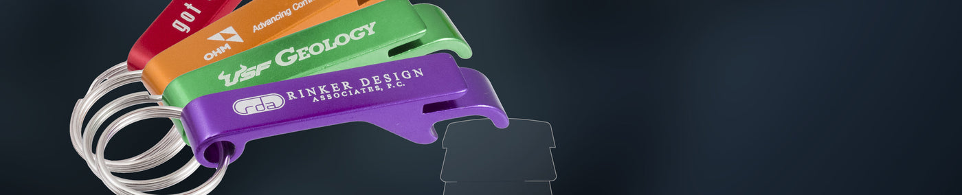 Aluminum bottle opener keychains customized with various logos in purple, green, orange and red. 