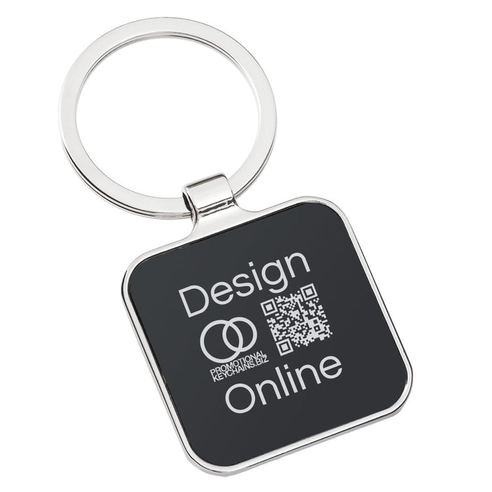 Finished example of black keychain with 'Design Online' text and QR code on a white background