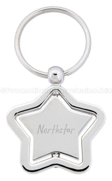A polished metal star-shaped keychain with a spinning center that is engraved with "Northstar".