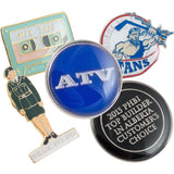 Layered image of Classic Raised Metal with Epoxy lapel pins showing different colors and shapes. Designs shown included a silver and blue pin with text ATV, another design is a figure in uniform, and another design of a mixed tape.  