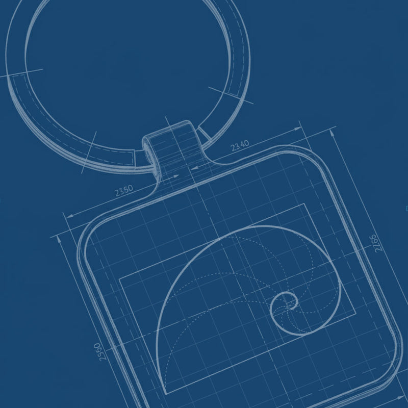 Technical drawing of a keychain with design measurements on a blue background