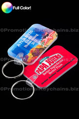 A set of full-colored vinyl keychains with various designs, including a Papa Johns pizza keychain and Atlantis UAHS.